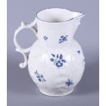 A 19th century blue and white Worcester cabbage jug, decorated with sprigs of flowers and