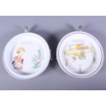 A pair of infant's Mabel Lucie Atwell figure decorated hotplates, with aluminium bases and stoppers,
