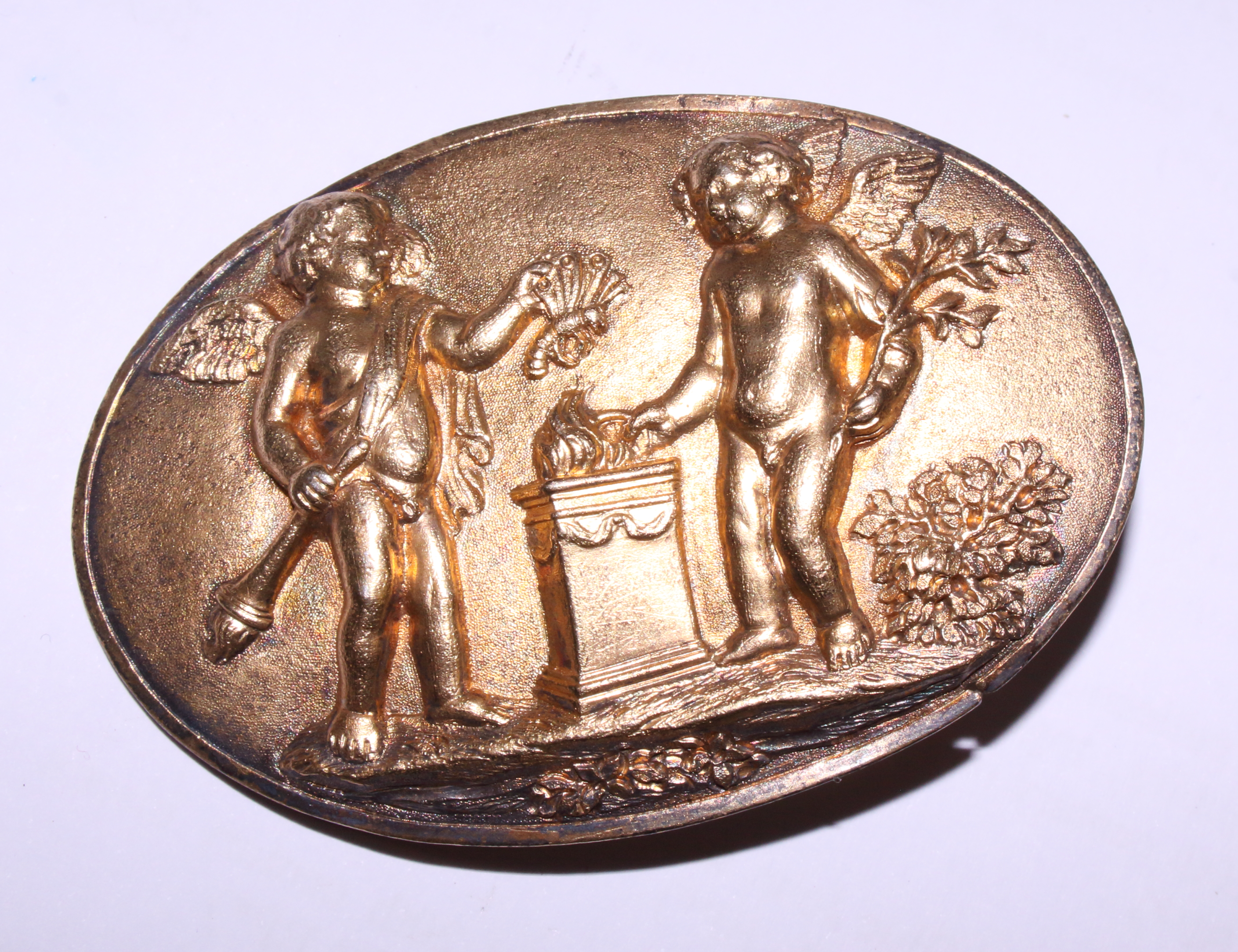 A pair of 19th century gilt metal oval brooches, panels with cherubs and Putti, 2 3/4" x 1 1/4" - Image 4 of 4