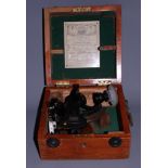 A Hughes & Sons 3 1/2" sextant, number 28523, in fitted mahogany case