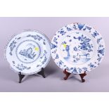 A Delft blue and white pottery charger decorated with fisherman in landscape, 13 1/4" dia,