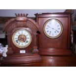 A late 19th century American Ansonia of New York mahogany cased mantel clock with twin winding holes