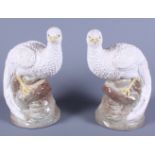 A pair of glazed pottery birds of paradise, 10 1/2" high