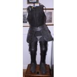 *A well reproduced part suit of armour of 16th century design, including breast and back plates,