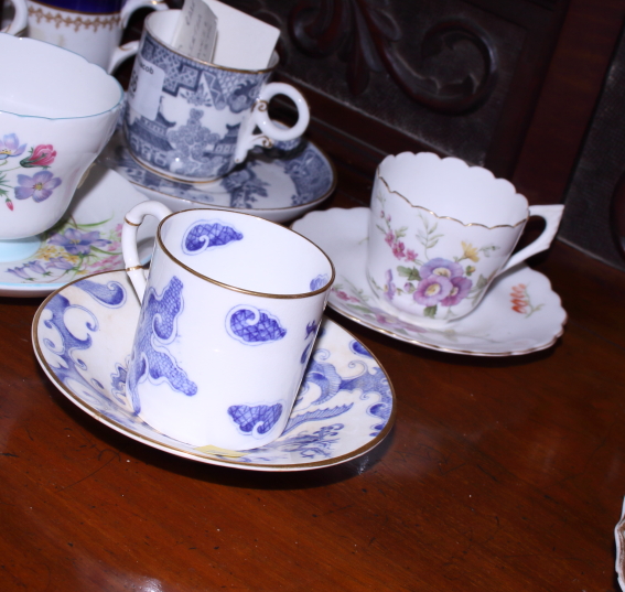 A collection of various English porcelain coffee cans and saucers, including Royal Worcester "Blue - Image 5 of 8