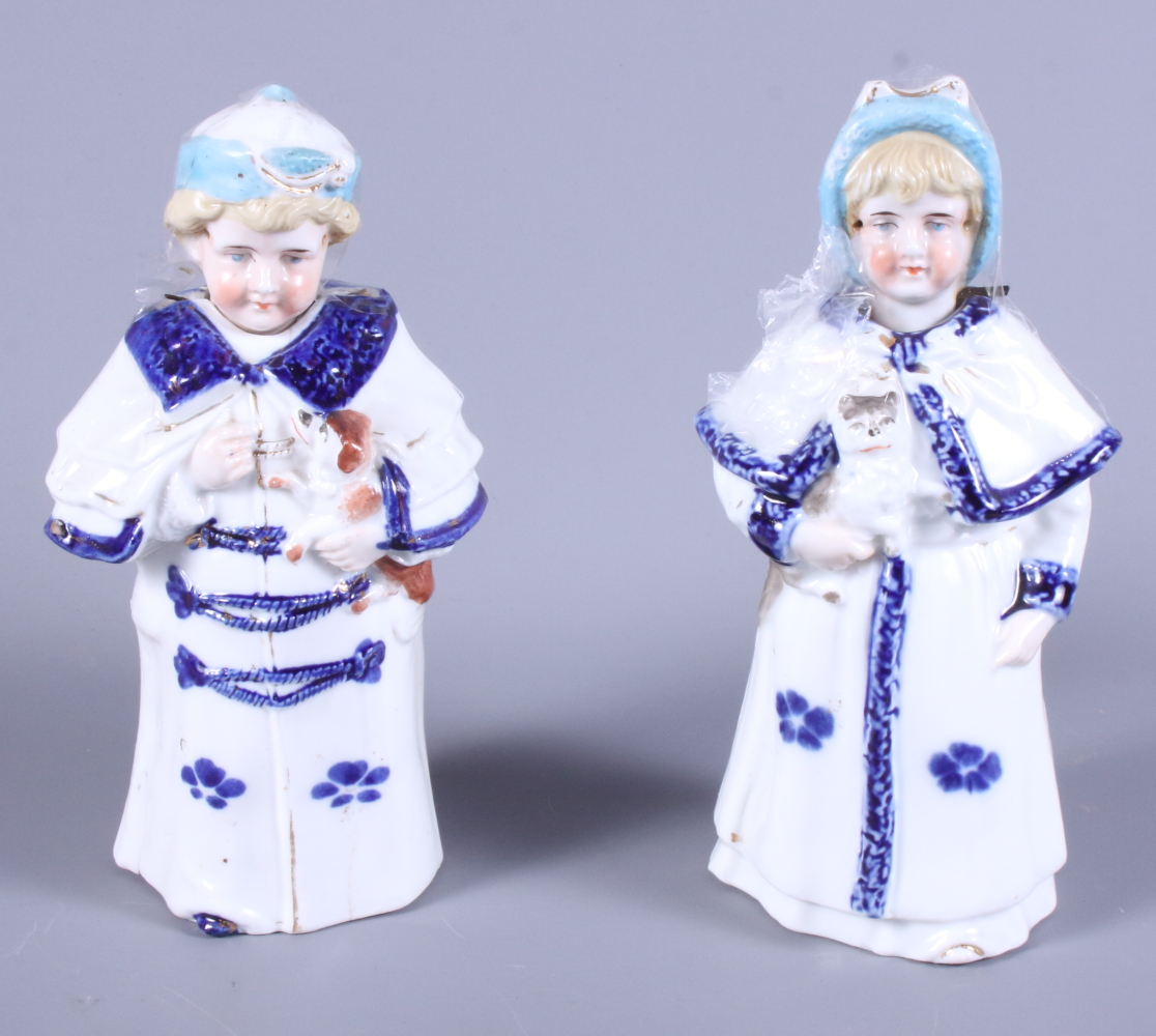 A pair of early 20th century German porcelain nodding dolls, 6 1/2" high
