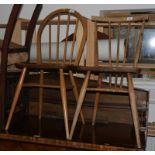 A set of four Ercol 1960s spindle back kitchen dining chairs and two similar Ercol spindle back