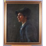 Early 20th century British School: oil on canvas, profile portrait of a young man wearing a hat,