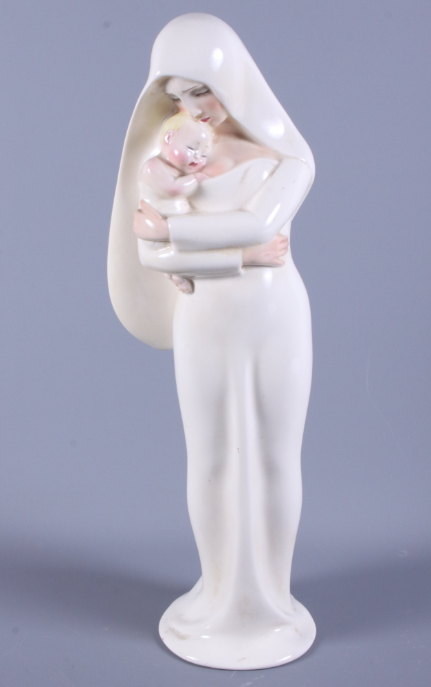 A 1930s Lenci pottery figure of a standing Madonna and child, wearing a long flowing white robe,