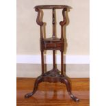 A Georgian design mahogany washbasin stand, fitted two triangular drawers, on cabriole supports, 12"