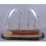 A 19th century scratch built scale model of a three-mast sailing boat, "Our Lady", under a glass