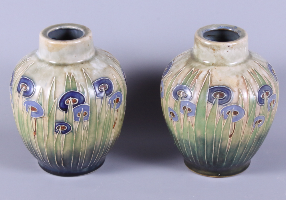 A pair of Royal Doulton stoneware vases, decorated with flowers in the Secessionist style, 8" high