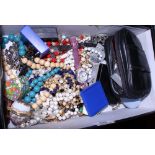 A collection of costume jewellery and watches, etc