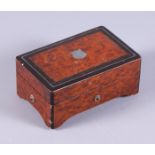 A mid 19th century Swiss walnut cased six air music box, the hinged lid with metal stringing