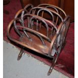 A late 19th century polished as mahogany bentwood magazine stand, 16" wide