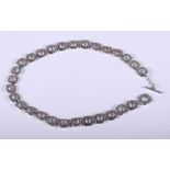 A 1970s 925 silver necklace, the links of square form bearing a hole to the centre, 17 3/4" long,