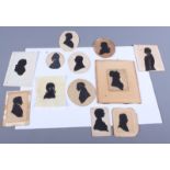 A collection of cut paper and other silhouettes, mostly 19th century