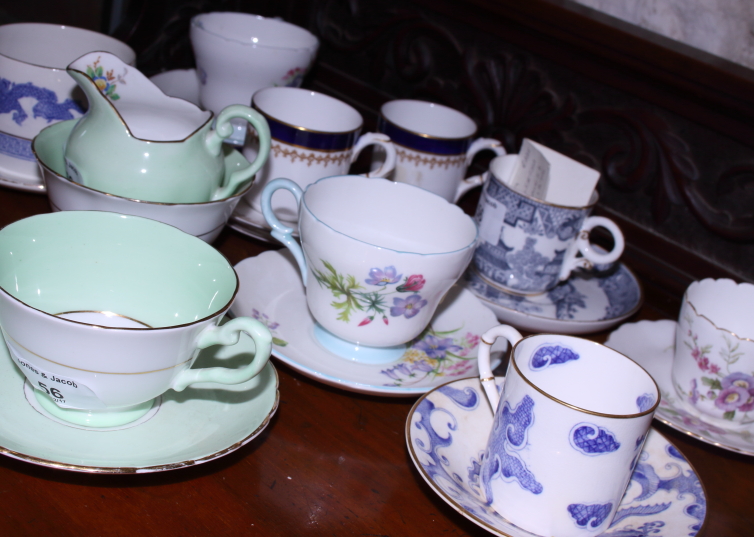 A collection of various English porcelain coffee cans and saucers, including Royal Worcester "Blue - Image 4 of 8