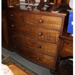An early Victorian mahogany bowfront chest of two short and three long graduated drawers, on