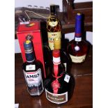 One bottle of Lamb's Navy Rum, one bottle of Remi Martin Brandy, one bottle of Courvoisier Brandy, a