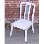 A set of six grey and white marble faced dining chairs