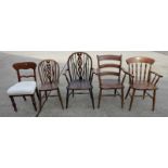 A Windsor bar back elbow chair, a spindle back elbow chair, a Windsor wheel back elbow chair, a