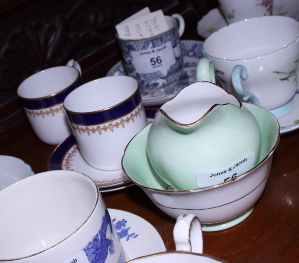 A collection of various English porcelain coffee cans and saucers, including Royal Worcester "Blue - Image 3 of 8