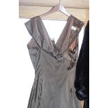 A Christian Dior bronze silk evening gown, labelled size 18 and number 2416