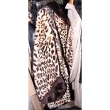 A mid 20th century leopard skin effect lady's jacket with fur collar