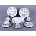 Twelve pieces of Herend hand-painted porcelain, including plates, bowls, etc