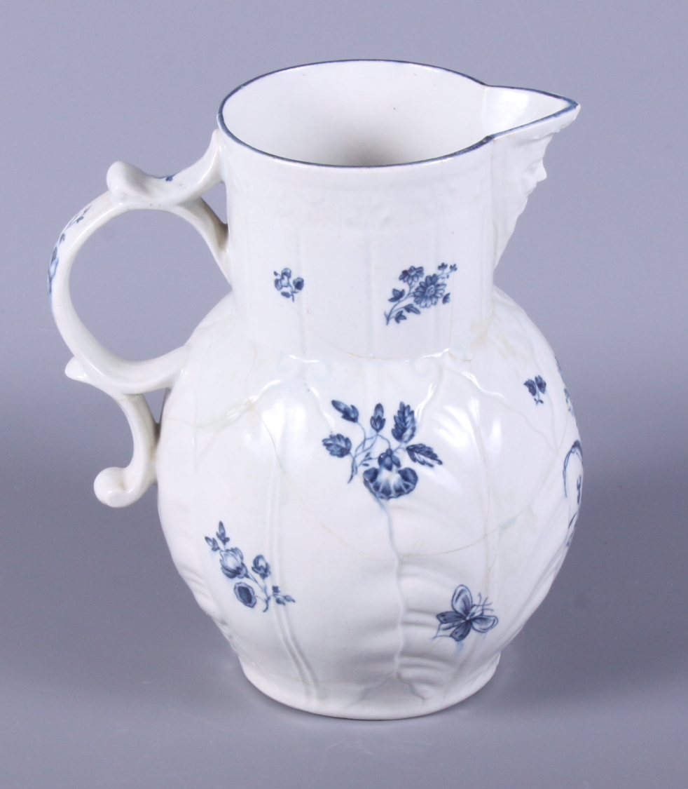 A 19th century blue and white Worcester cabbage jug, decorated with sprigs of flowers and