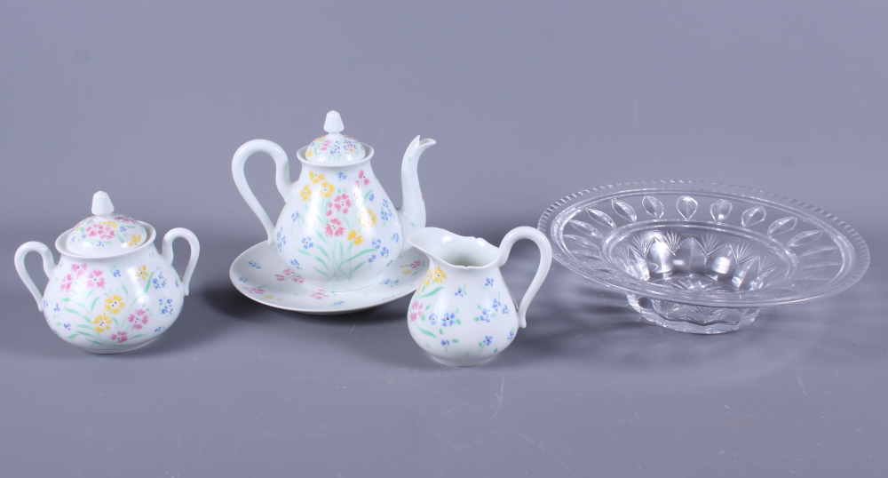 A bachelor’s hand-painted Limoges porcelain teaset, decorated with sprays of flowers, together