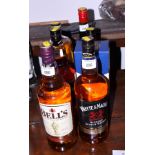 Six bottles of blended whiskey and a bottle of Bushmills Irish Whiskey