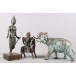 A Chinese bronze model of Shao Lao seated on the back of a horse, a Balinese? bronze of a standing