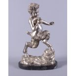 A 20th century silvered model of Pan, on a shaped black veined marble base, 12" high