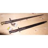 Two French 19th century bayonets, one bearing script marks and other impressed marks, both with