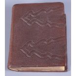 A leather bound carte de visite photograph album containing a superb portrait collection of