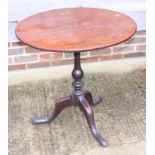 A Georgian tilt top occasional table with walnut top, on mahogany tripod base, 31" dia