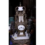 A 20th century French Empire design mantel clock by Regnant of Paris, the movement flanked by two