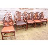 A set of twelve matched Georgian mahogany dining chairs with cameo inlaid and pierced splat oval
