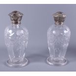 A pair of silver topped dressing table jars, Boots Pure Drug Company, Birmingham 1919, each cut with