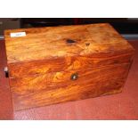 A 19th century rosewood tea caddy together with a set of turned ivory chequers, various dominoes and