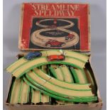 A boxed Louis Marx "Streamline Speedway" game, together with various tin-plate trains and track