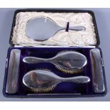 A Walker & Hall matched silver six-piece dressing table set comprising four brushes, a comb and a