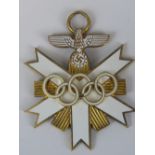 A reproduction Nazi German enamelled Olympic grand cross; 6.5cm long.