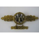 A fine reproduction Nazi Luftwaffe "200" bomber clasp; 7.5cm wide.