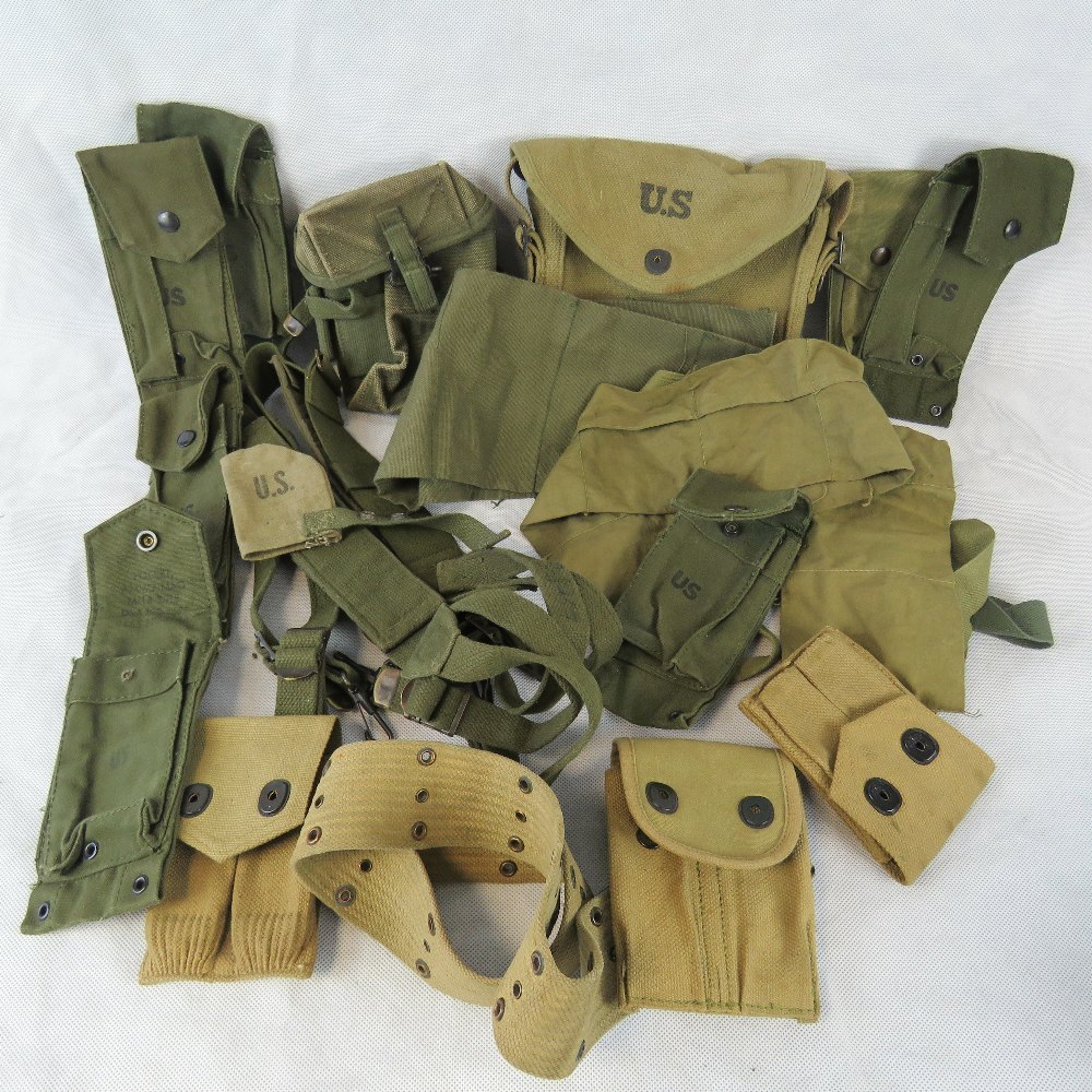 A quantity of original and reproduction American military pouches and strap, U16, Thompson etc.