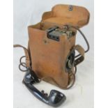 An American Military field telephone in case.