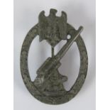 A Nazi Army Flak badge; no marking verso; 6cm long.