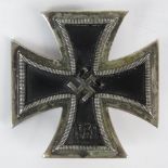 A reproduction Nazi German Iron Cross first class; no markings verso; 4.5cm long.